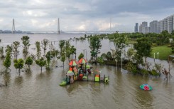 This aerial photo taken on July 28, 2020 shows a flooded sports ground along the Yangtze River in Wuhan in China's central Hubei province