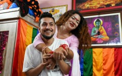 Maya Gurung (R) and Surendra Pandey held a Hindu marriage ceremony in 2017, and live together with their dog and cat