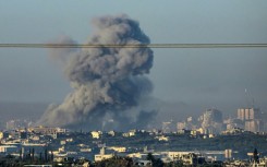 Smoke billows over Gaza during Israeli bombardment amid continuing battles between Israel and the militant group Hamas