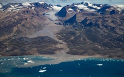 This aerial photograph taken on August 11, 2023, shows a glacier around "Constable Point" severely melted due to warm temperatures along the Scoresby Sound Fjord, in Eastern Greenland