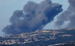 Smoke billows following an Israeli bombardment of hills close to the town of Marwahin in southern Lebanon