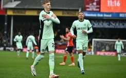 Chelsea's Cole Palmer (L) celebrates after scoring against Luton