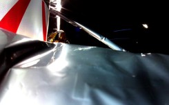 This image released by Astrobotic on January 8, 2024 shows the first picture from Astrobotic's Peregrine Lunar Lander in space, with Multi-Layer Insulation in the foreground