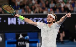 Stefanos Tsitsipas celebrates after victory against Australia's Jordan Thompson at the Australian Open