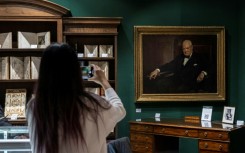 Winston Churchill’s personal desk and a portrait of the late British leader by Arthur Pan, part of the Winston S. Churchill Collection Of Steve Forbes, at the Winter Show in New York City on January 18, 2024