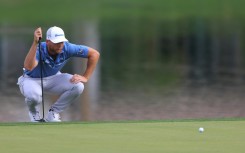 American Sam Burns lines up a putt on the way to an 11-under par 61 and the second-round lead in the US PGA Tour American Express tournament in La Quinta, California