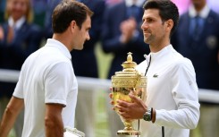 Roger Federer and Novak Djokovic (right) have won 46 Grand Slam titles between them