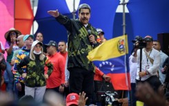 Venezuelan President Nicolas Maduro greets supporters during a rally in Caracas on January 23, 2024