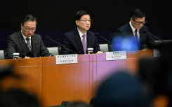 Hong Kong will create its own national security law "as soon as possible", city leader John Lee (C) said Tuesday