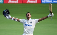 India's Yashasvi Jaiswal celebrates after scoring his first Test double century during the second day of the second Test against England