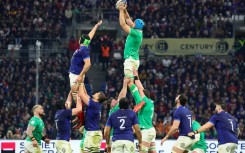 Ireland's Tadhg Beirne (CR) catches the ball during the Six Nations opener against France at the Stade Velodrome in Marseille