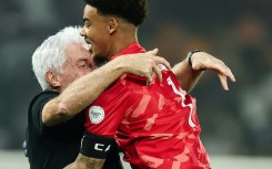 South Africa coach Hugo Broos embraces Ronwen Williams after the goalkeeper's heroics against Cape Verde took them through to the Africa Cup of Nations semi-finals