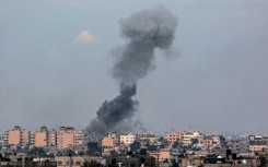 Smoke rises over the Gaza city of Khan Yunis following Israeli bombardment on February 5, 2024 