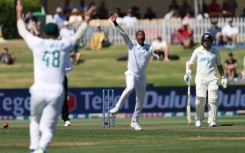 South Africa's Tshepo Moreki celebrates claiming Devon Conway's wicket during day one of the first Test against New Zealand