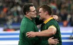 Rassie Erasmus (L) eyes a historic third successive Rugby World Cup title after committing to the Springboks till 2027