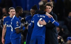 Chelsea boss Mauricio Pochettino (right) hugs defender Thiago Silva