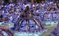 Members of the Porto da Pedra samba school perform during the first night of the Carnival parade at the Marques de Sapucai Sambadrome in Rio de Janeiro, Brazil on February 11, 2024