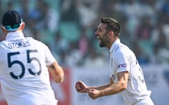 Mark Wood celebrates the wicket of Shubman Gill