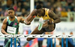 US sprint king Grant Holloway set a world record in the 60m hurdles at the US Indoor Championships on Friday