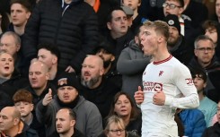 Manchester United's Rasmus Hojlund celebrates after scoring at Luton