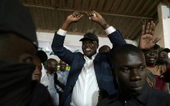 Sall talked to local residents and activists as he made his way through the stalls, workshops and houses