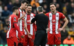 Jack Robinson (right) squared up to teammate Vinicius Souza (not pictured) during Sheffield United's 1-0 defeat at Wolves