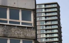 A crumbling housing estate in Stratford next to the gleaming luxury apartments of Olympic Park