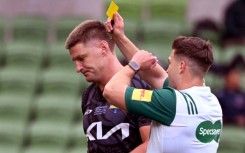 Wellington Hurricanes star Jordie Barrett (L) had his yellow card upgraded to a red in last Saturday's win over the Queensland Reds in Melbourne