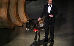 Late-night television talk show host Jimmy Kimmel -- seen here hosting the Oscars in 2023 -- will be back for more in 2024