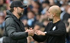 Jurgen Klopp (left) is preparing to pit his wits against Pep Guardiola 