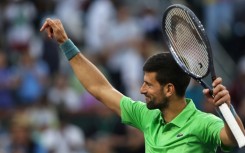 Top-ranked Novak Djokovic of Serbia celebrates a victory over Aleksandar Vukic of Australia at Indian Wells