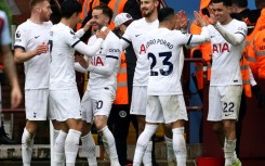 Tottenham celebrate during their victory at Aston Villa