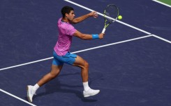 Spain's Carlos Alcaraz plays a backhand on the way to a third-round victory over Felix Auger-Aliassime of Canada at the WTA-ATP Indian Wells Masters