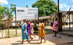 Pregnant women take a walk outside the maternity ward at Karanda Mission Hospital in Zimbabwe's Mount Darwin