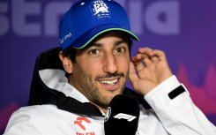 RB's Australian driver Daniel Ricciardo speaks at a press conference in Melbourne