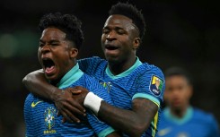 Brazil's Endrick (L) celebrates with Vinicius Junior after his winner against England