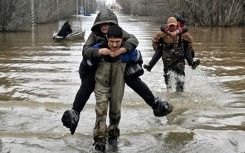 Overflowing rivers had covered whole villages and towns in northern Kazakhstan and Russia's southern Urals 