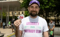 'Literally Anybody Else' poses with his driver's license, hoping for luck on his 2024 White House bid