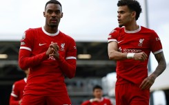 Liverpool's Ryan Gravenberch (L) celebrates scoring against Fulham