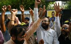 Crowds gathered at the headquarters of Kejriwal's Aam Aadmi Party after the ruling to celebrate his impending release with the customary distribution of sweets