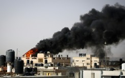 Smoke rises from a fire after Israeli bombardment in Rafah, whose eastern sector Israeli troops have entered despite international objections