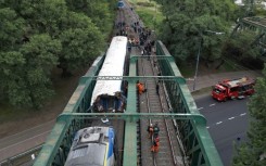 Aerial view of emergency crew members working on a train crash site in Buenos Aires on May 10, 2024