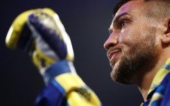 Ukraine's Vasiliy Lomachenko won the vacant IBF lightweight title by knocking out Australia's George Kambosos