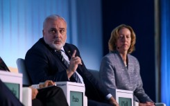 Petrobas CEO Jean Paul Prates (L) speaks during the CERAWeek oil summit in Houston, Texas in March 2024