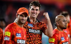 Sunrisers Hyderabad captain Pat Cummins (centre) celebrates victory over Punjab Kings on Sunday