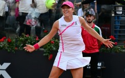 Three of the best: Iga Swiatek celebrates after winning the Rome Open for a third time