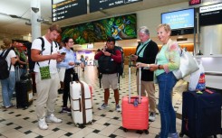 (L-R) Erko Isanovic, Nichole Hatten, Wei Liak, Phil Hatten, and Mary Hatten are seen after disembarking a flight arriving from Noumea at Brisbane International Airport in Brisbane on May 21, 2024