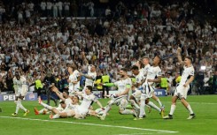 Real Madrid's players celebrate beating Bayern Munich at the Santiago Bernabeu to reach the Champions League final