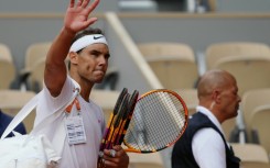 'Give my all': Rafael Nadal waves to spectators as he leaves the court after taking part in a practice session at the French Open