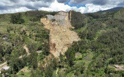 This aerial view taken on May 27, 2024 shows a general view of the area affected by a landslide the region of Maip Mulitaka, in Enga Province, Papua New Guinea.